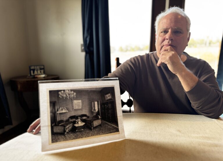 David Cassirer with Photograph of Apartment 1